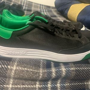 Adidas Rod Laver tennis shoes.